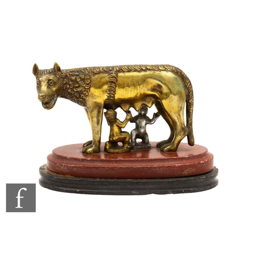 1001 - A late 19th to early 20th Century brass model of the she wolf with the two infants Romulus and Remus... 