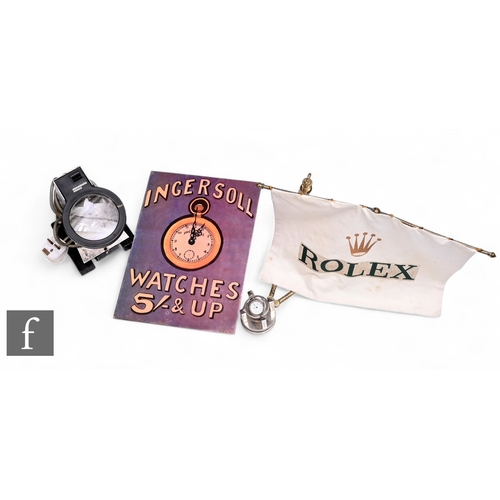 539 - A Rolex printed fabric banner on an adjustable brass arm, a replica Ingersol display sign, a Mannesm... 