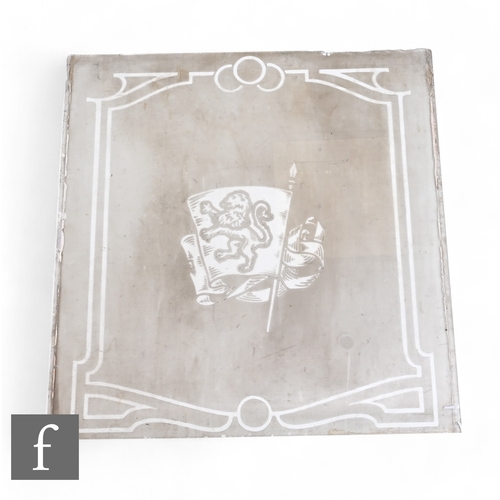 541 - A square glass frosted glass panel of a rampant lion within a Heraldic panel.