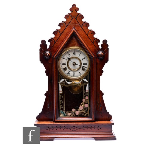 741 - An early 20th Century American steeple mantle clock, enclosed by a silvered glazed door, on plinth b... 