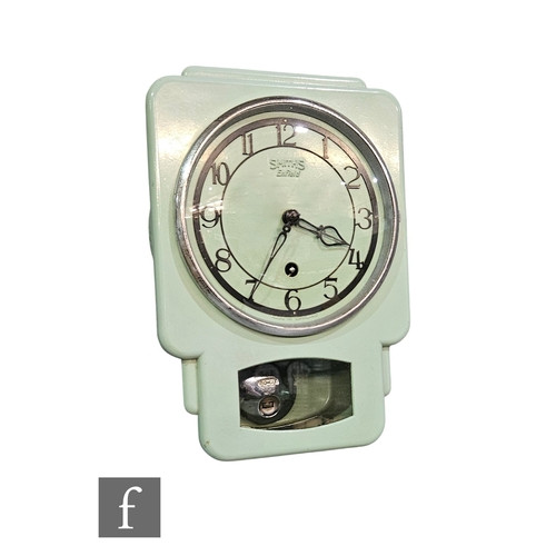 747 - A 1940s Smiths pale green metal cased wall clock, height 27cm.