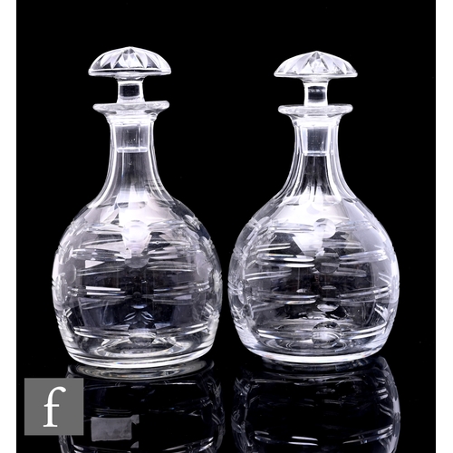 261 - A pair of post war clear crystal glass decanters by Webb Corbett, designed by Irene Stevens, each of... 