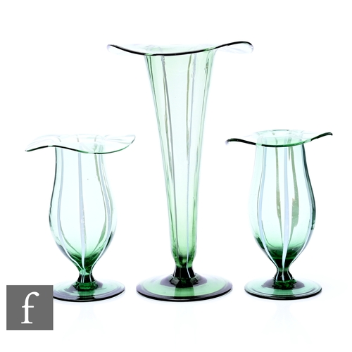 263 - An early 20th Century Stuart & Sons three piece garniture with a tall footed trumpet vase with w... 