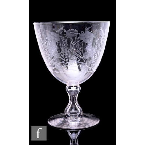 265 - A large late 19th Century Stourbridge clear crystal glass goblet, the round funnel bowl engraved wit... 