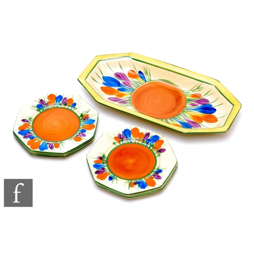 151 - A Clarice Cliff complete sandwich set circa 1930, comprising shape 334 sandwich tray and six octagon... 