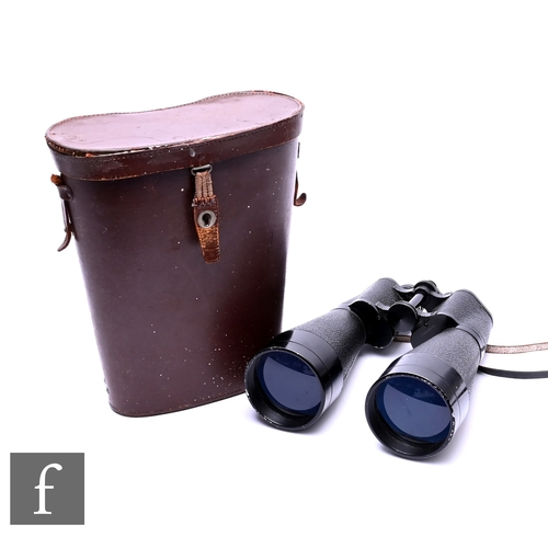 587 - A pair of Beck Kassel CBS 11 x 80 binoculars in a leather case.