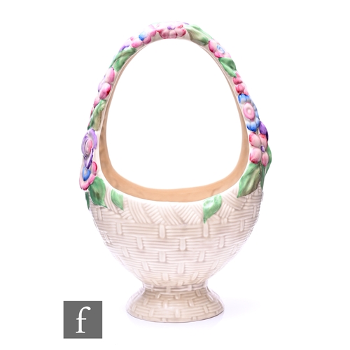 165 - A large Clarice Cliff My Garden Gaiety flower basket circa 1938, with a high loop handle, relief mou... 