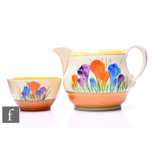 180 - A Clarice Cliff Tankard shape sugar bowl circa 1931, hand painted with Crocus sprays with yellow, gr... 