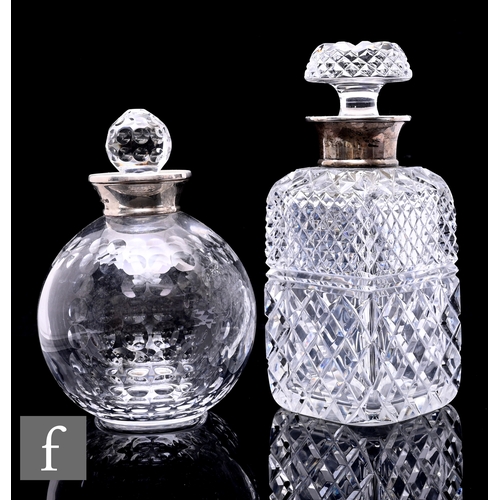 283 - A contemporary clear crystal decanter and stopper, cut and polished in the form of a golf ball, moun... 