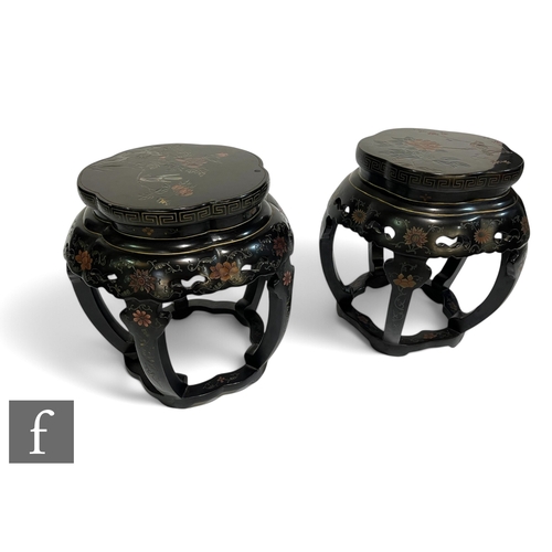 863 - A pair of 20th Century Chinese ebonised jardiniere stands, decorated with birds and chrysanthemums, ... 