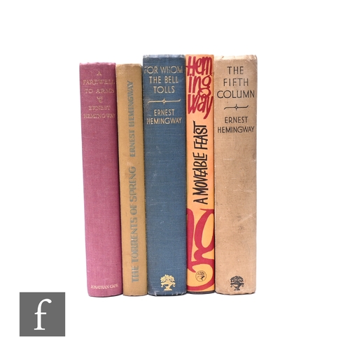 699 - Ernest Hemingway : A collection of titles to include A Moveable Feast, first edition 1964, with orig... 