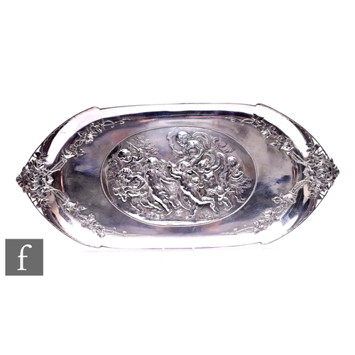 600 - A large WMF oval plated serving tray, the oval centre embossed with a classical scene of cherubs wit... 