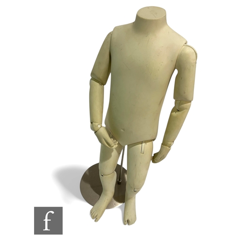 619 - A late 20th Century articulated mannequin of a child by Fusion Specialities Inc, USA, model number P... 