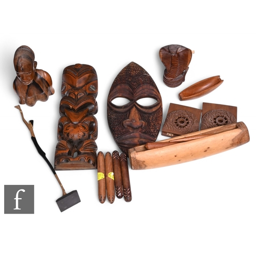 614 - An African miniature drum, a cobra, a bust, a totem and other wooden items. (qty)