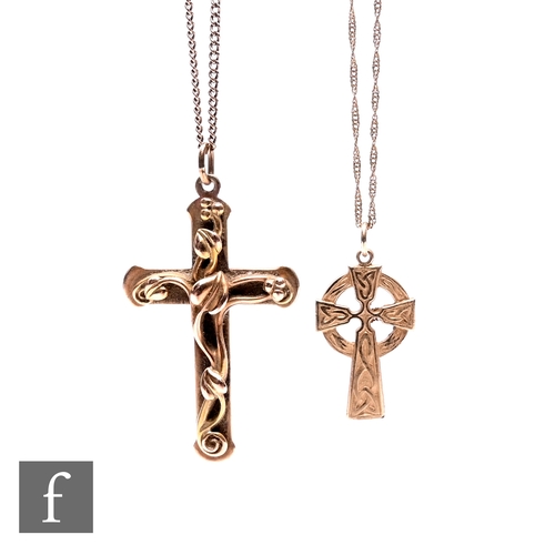 411 - Two 9ct gold crucifix and cross pendants on chains, both stamped .375, longest total length on chain... 