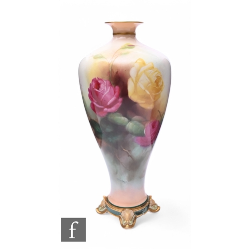 98 - C V White for Royal Worcester, a rose painted vase, shouldered form, on circular base with four foli... 