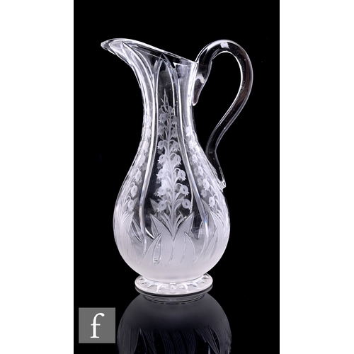 299 - A late 19th Century Stourbridge clear crystal jug in the manner of Richardsons, the footed swollen o... 