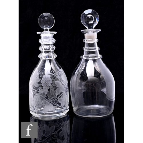 300 - A 19th Century clear crystal taper decanter in the Georgian taste with facet cut three ring neck bel... 