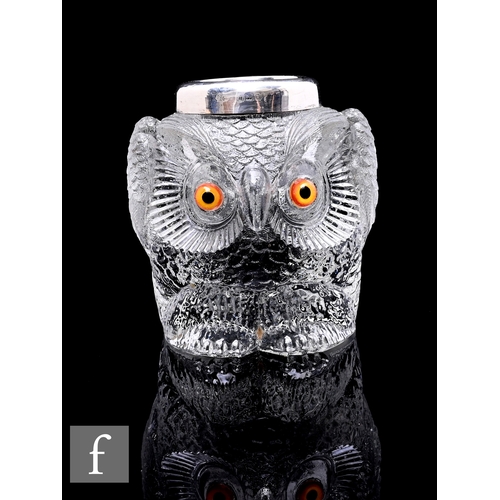 303 - An Edwardian pressed glass match holder and strike modelled as a seated owl in clear crystal with ap... 