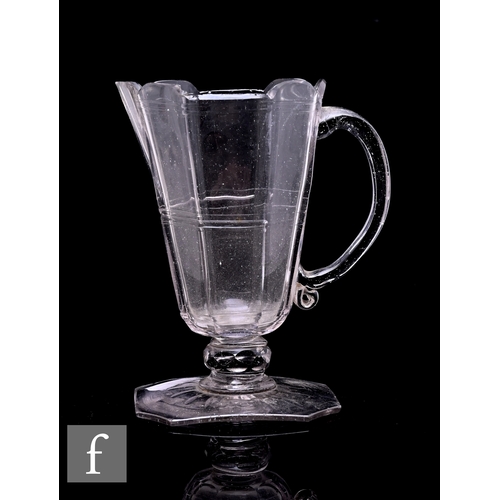 349 - An 18th Century Silesean jug circa 1760, the tapered octagonal body with applied loop handle and ver... 