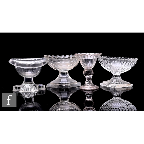 350 - A collection of 18th Century clear crystal glass table salts to include a roll rim example with quat... 