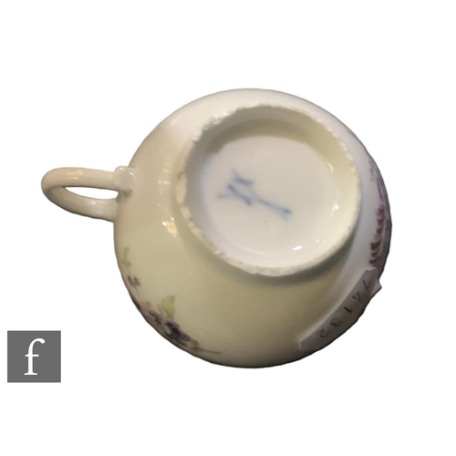 61 - A collection of 18th Century Meissen, to include four tea cups and saucers, two of shallow form, and... 