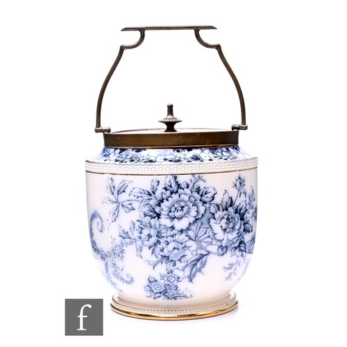 100A - A late 19th Century flow blue Peony biscuit barrell, of shouldered form with metal mounts and swing ... 