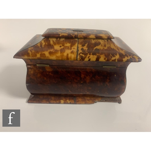 518 - A 19th Century tortoiseshell tea caddy, fitted two division interior enclosed by a pagoda top over a... 