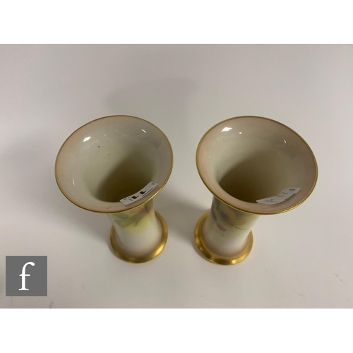 11 - Kitty Blake for Royal Worcester, a pair of fruit painted vases, circa 1935, of trumpet form, decorat... 