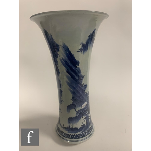 375 - A matched pair of Chinese blue and white Kangxi style vases, each of the slender trumpet form vase, ... 