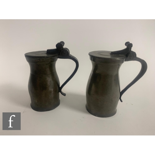 491 - Three 17th Century or earlier pewter flat lidded hammerhead pewter tankards, tallest 14cm, plain and... 