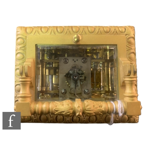 754 - A late 19th to early 20th Century French gilt carriage clock, Arabic dial and second subsidiary dial... 