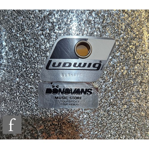 465 - A Ludwig four shell drum kit in silver sparkle finish, the bass drum 22 x 18 inches, tom 1 12 x 9 in... 