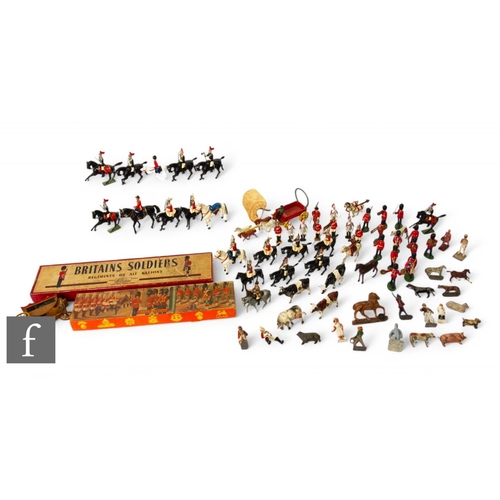 263 - A collection of assorted metal and plastic figures, soldiers, cavalry and farm animals with a Britai... 