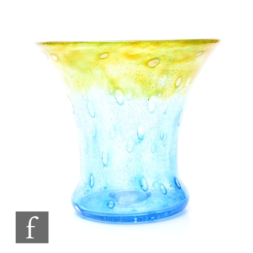 988 - Monart - A shape GC glass vase of flared form, decorated with internal bubbles and graduated yellow ... 