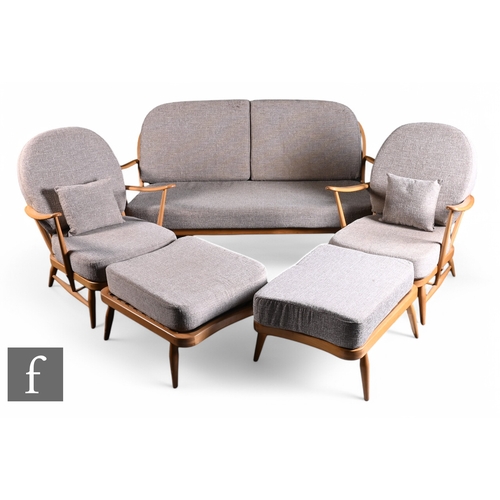 947 - Lucian Ercolani - Ercol Furniture - A beech framed five-piece lounge suite, comprising of a model 20... 