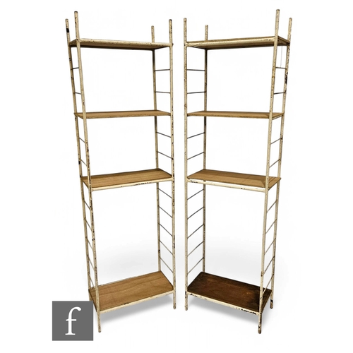 984 - Unattributed Maker - A pair of 1960s industrial tubular steel display shelving racks in a white pain... 