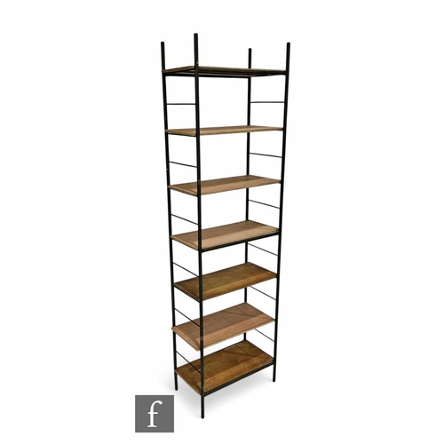 985 - Unattributed Maker - A single 1960s tubular steel display shelving rack in a black painted finish, w... 