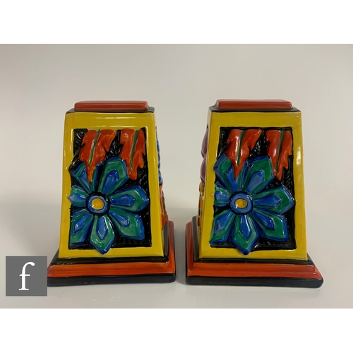 584 - Clarice Cliff - Floreat - A pair of shape 406 book ends circa 1930, relief moulded with stylised abs... 