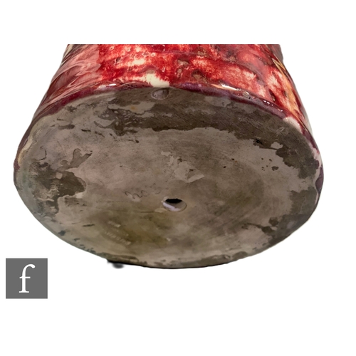 220 - Ruskin Pottery - A High Fired vase and stand, circa 1925, slender shouldered sleeve form with everte... 