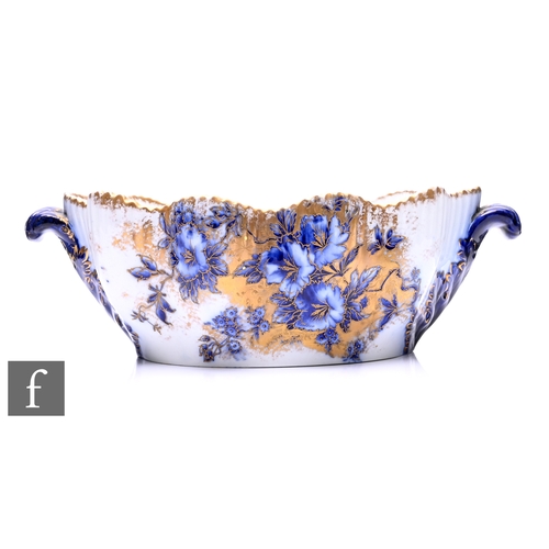 265 - Wiltshaw & Robinson - Carlton Ware - A 'Petunia' pattern twin handled monteith, circa 1900, of o... 