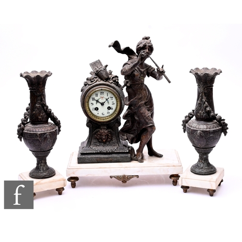 A late 19th Century French white marble and spelter figural clock garniture, bearing title plaque 'Muse des Bois, par L & F Moreau (Medaille d'Or), the clock movement striking on a bell and stamped 6323, height 46cm, flanked by a pair of swagged garland vases, height 35.5cm, some damage. (3)
