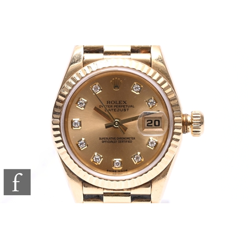 A lady's Rolex 18 carat yellow gold automatic Oyster Perpetual Datejust wristwatch, with date aperture, centre seconds, diamond set hour markers and screw down crown and screw back, the dial signed Rolex, Oyster Perpetual, Superlative Chronometer Officially Certified, model reference number 79178, on a conforming Rolex President 18 carat gold bracelet with concealed deployant clasp numbered 8570, stamped 750 18K, complete with original purchase receipt from Ernest Jones dated 24th January 2003.