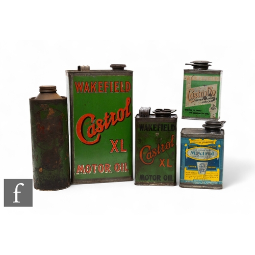 212 - A Wakefield Castrol XL motor oil can, height 29cm, a smaller version, height 19.5cm, an oil canniste... 