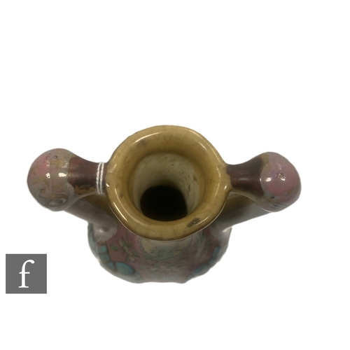 59 - A Chinese famille rose vase, of flattened ovoid form with bird head handles, Qianlong four-character... 