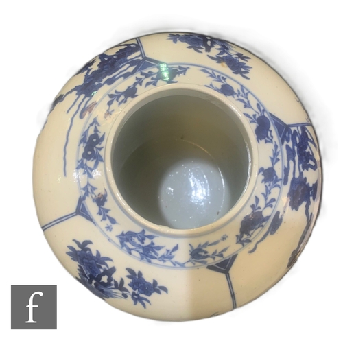 1 - A late 19th Century Chinese blue and white Kangxi style vase and cover, decorated with figure in int... 