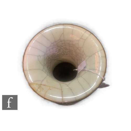 40 - A Chinese Ge-type vase, of pear form rising to a neck with everted rim, and raised on a splayed foot... 