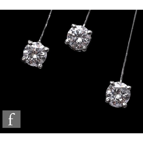 1046 - A diamond fringe necklace, the front section set with a uniform row of brilliant-cut diamonds, suspe... 