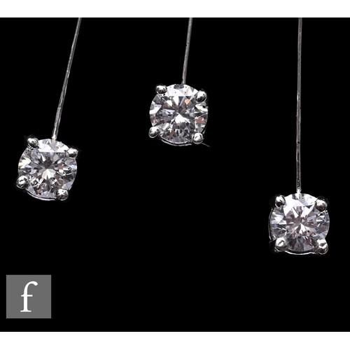 1046 - A diamond fringe necklace, the front section set with a uniform row of brilliant-cut diamonds, suspe... 