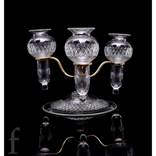 513 - A late 19th Century clear cut crystal table centre epergne in the manner of F & C Osler of Birmi... 